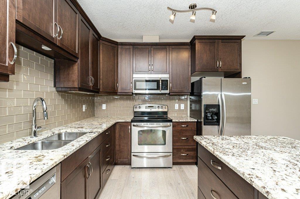 #256 6079 MAYNARD WY NW — photo 16