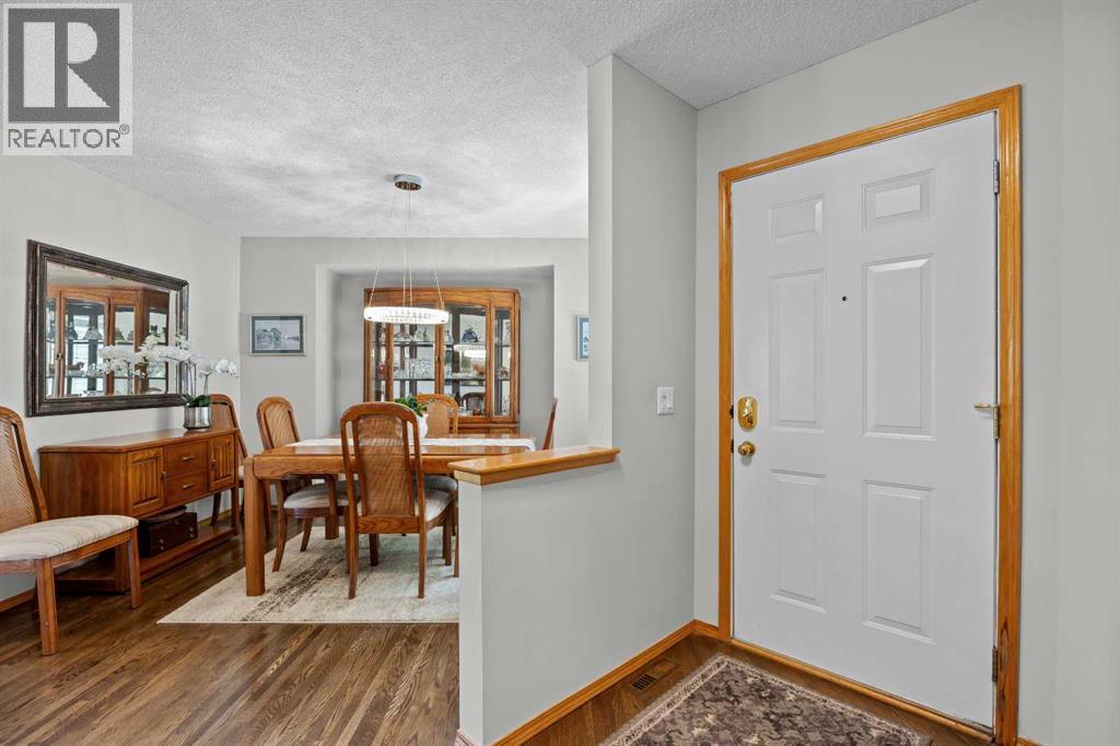 A welcoming front entry opens to the formal dining room, setting a gracious tone the moment you walk in