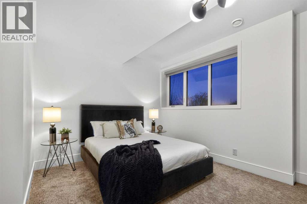 Lower level guest bedroom #2 with ensuite and walk-in closet
