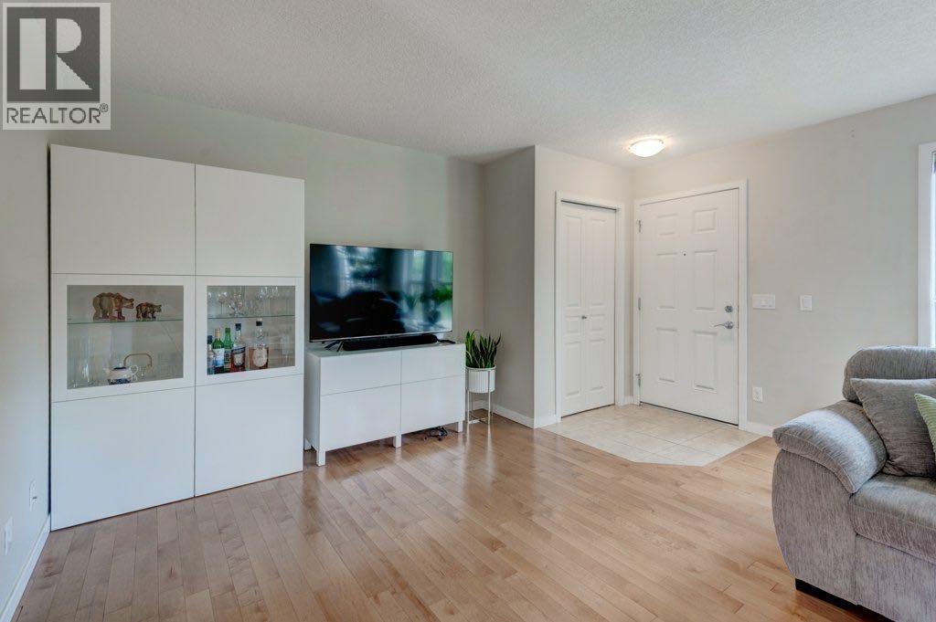 Bright & Spacious Living Room with Hardwood Floor