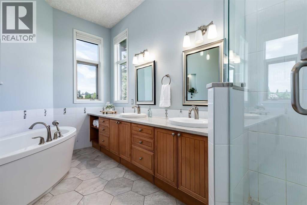 Primary ensuite with custom cabinetry