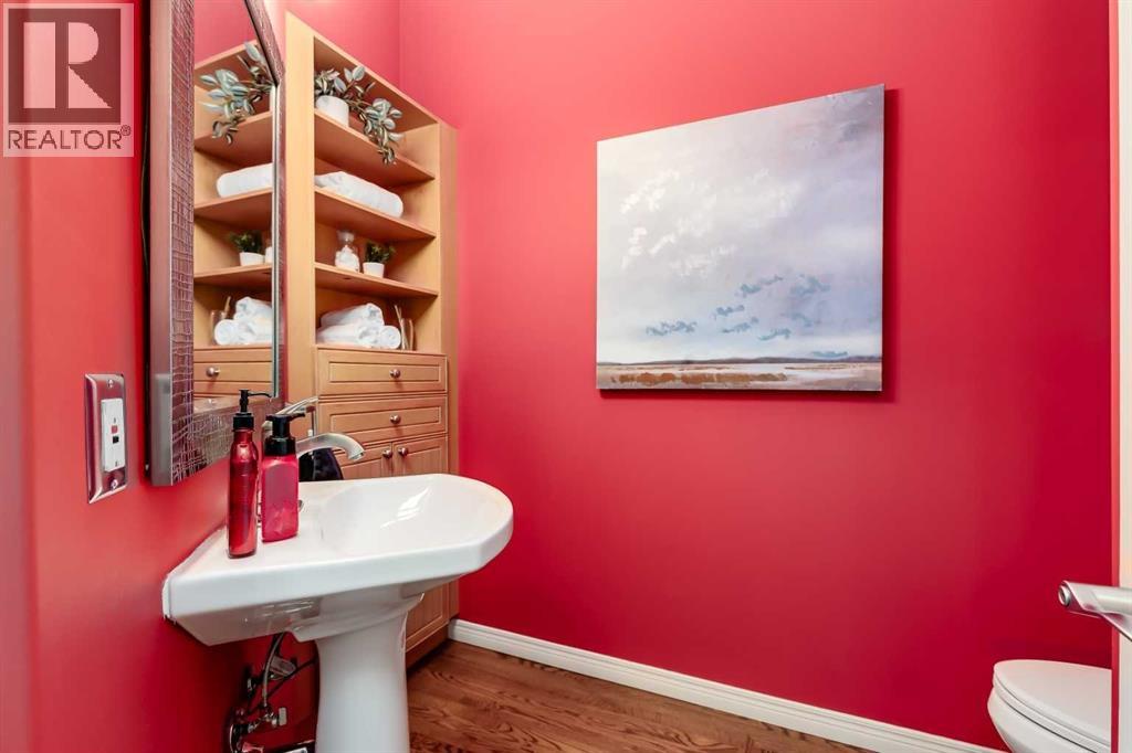 The stylish powder room completes the main level