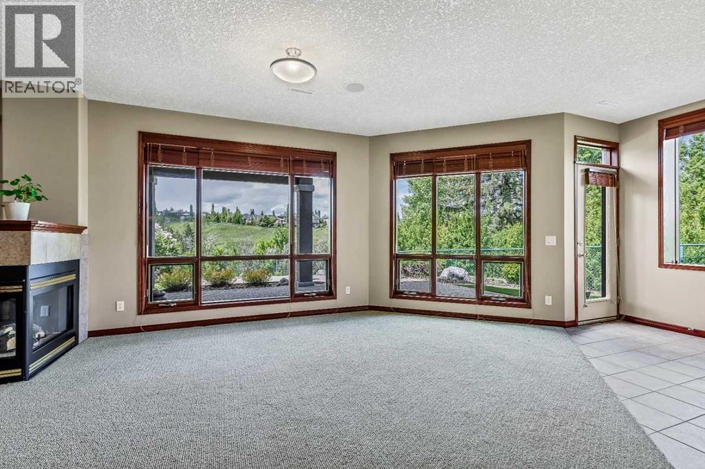 In-floor heating throughout the lower living level, and also includes a gas-burning 3-sided fireplace