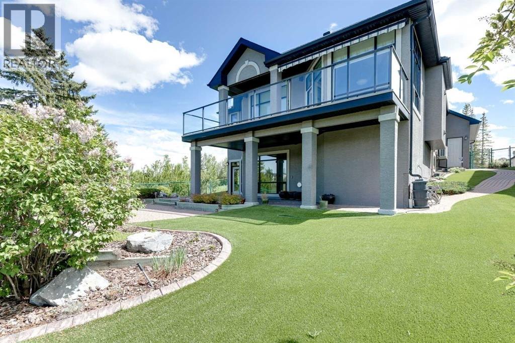 Professionally landscaped, fully fenced with an unobstructed view