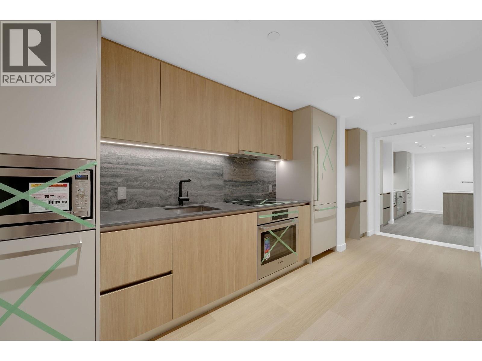 101 & 103 511 CLARKE ROAD, Coquitlam
