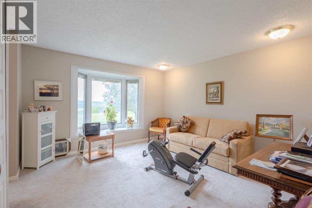 119 Bearspaw Village Crescent — photo 27