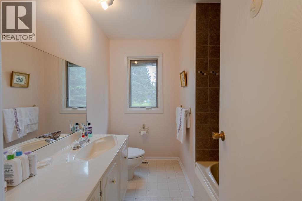119 Bearspaw Village Crescent — photo 26