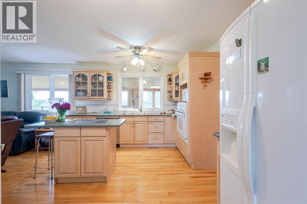 119 Bearspaw Village Crescent — photo 17