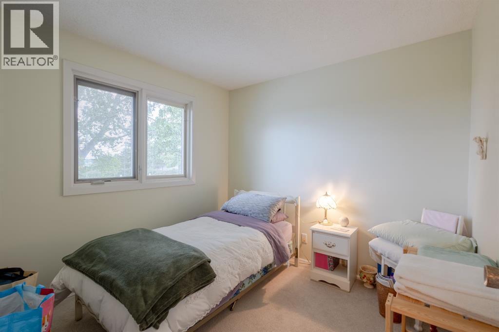 119 Bearspaw Village Crescent — photo 22