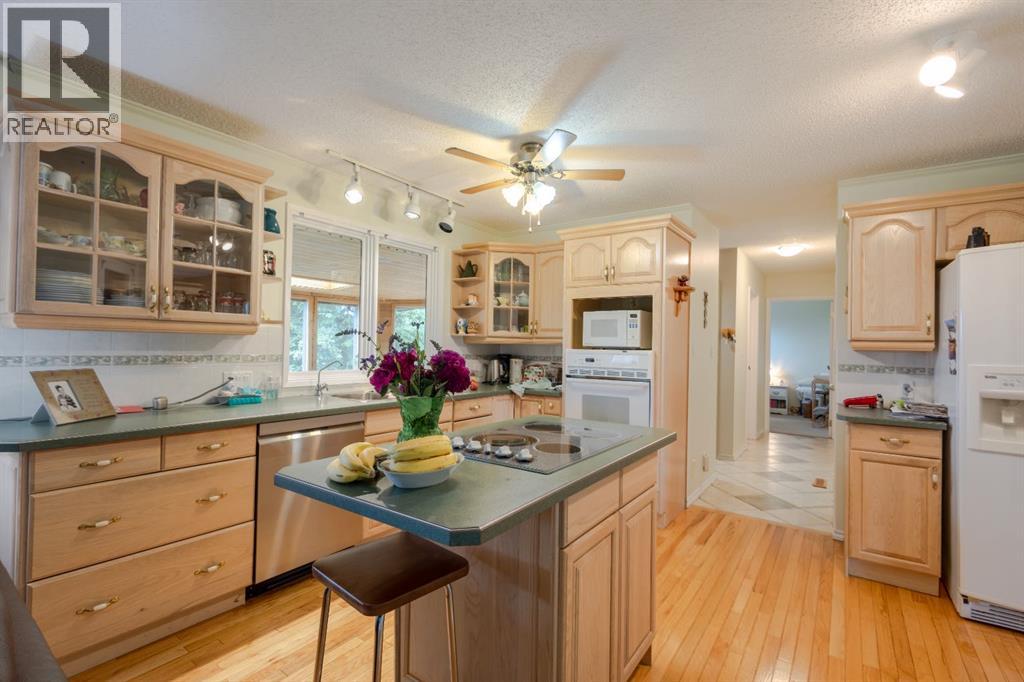 119 Bearspaw Village Crescent — photo 18