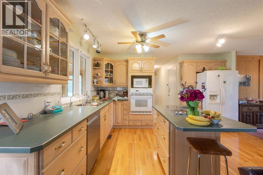 119 Bearspaw Village Crescent — photo 19