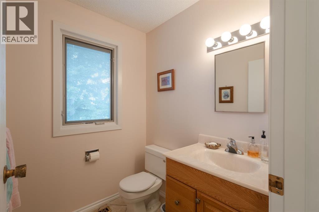 119 Bearspaw Village Crescent — photo 23