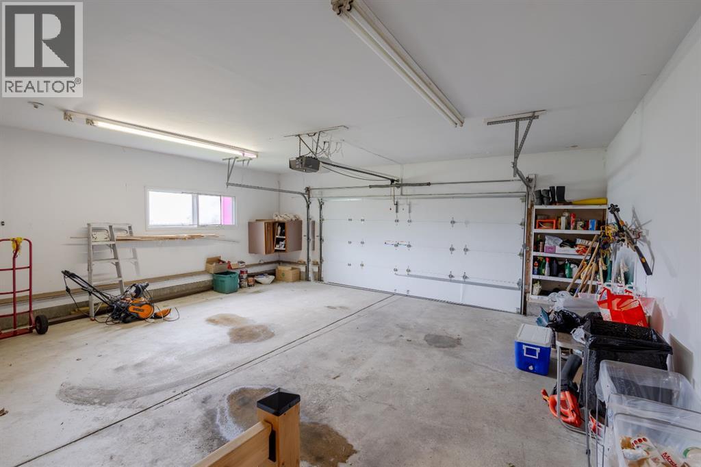 119 Bearspaw Village Crescent — photo 31