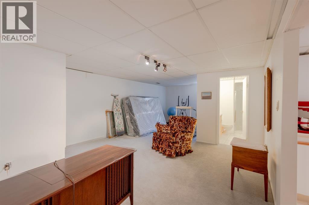 119 Bearspaw Village Crescent — photo 33