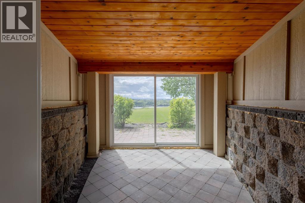 119 Bearspaw Village Crescent — photo 34