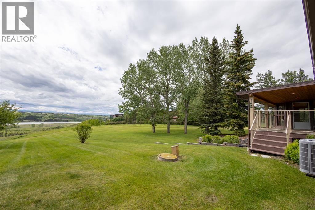 119 Bearspaw Village Crescent — photo 36