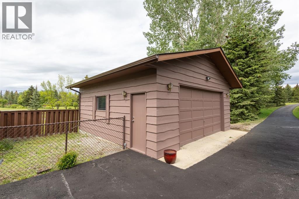 119 Bearspaw Village Crescent — photo 42