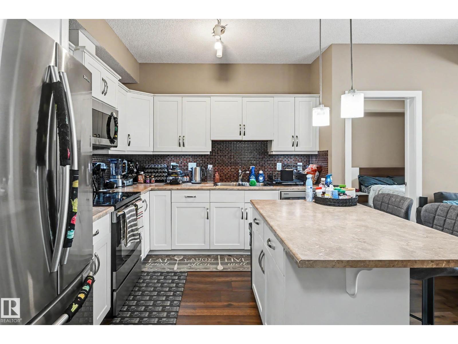 #402 8730 82 AV NW - 9