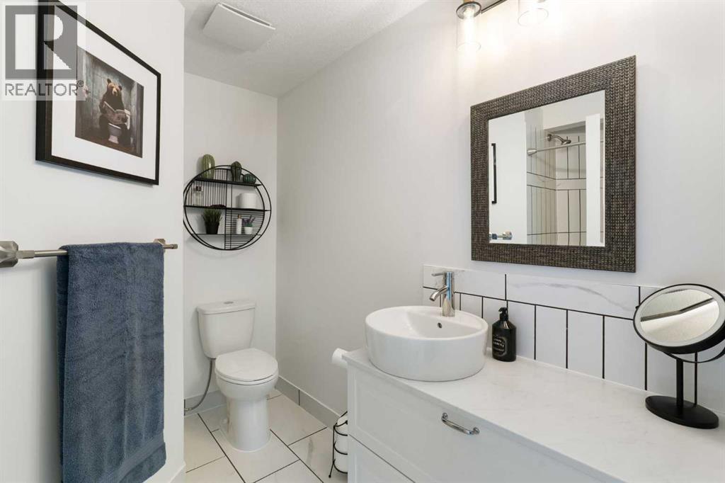 This 3-piece ensuite maintains the elegant design found throughout this home