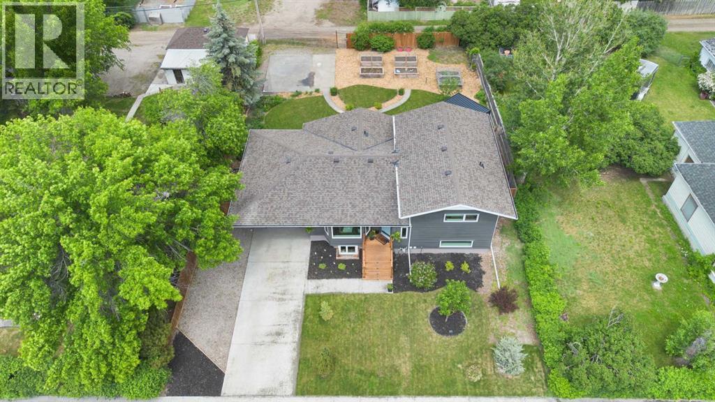 Aerial view gives better perspective on the house and size of the lot