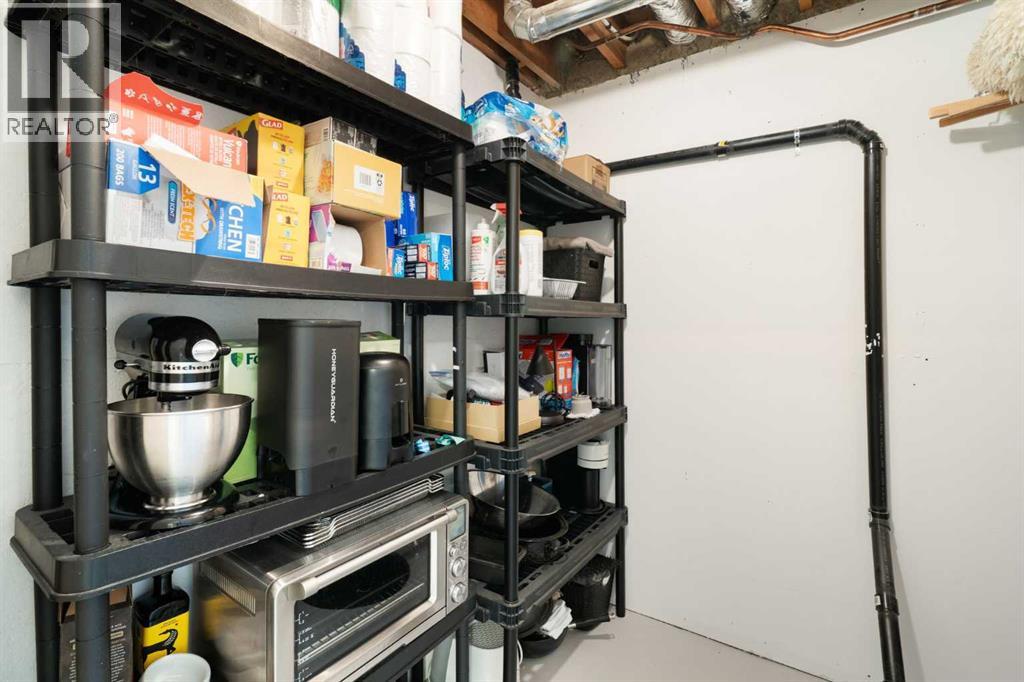 Plenty of storage in the utility room that also features a sump pump. The basement is also pre-plumbed for in-floor heating