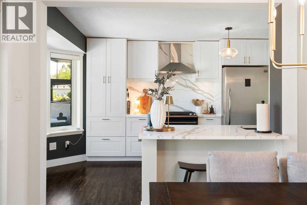 Contemporary shaker cabinets pair beautifully with the crisp quartz counters