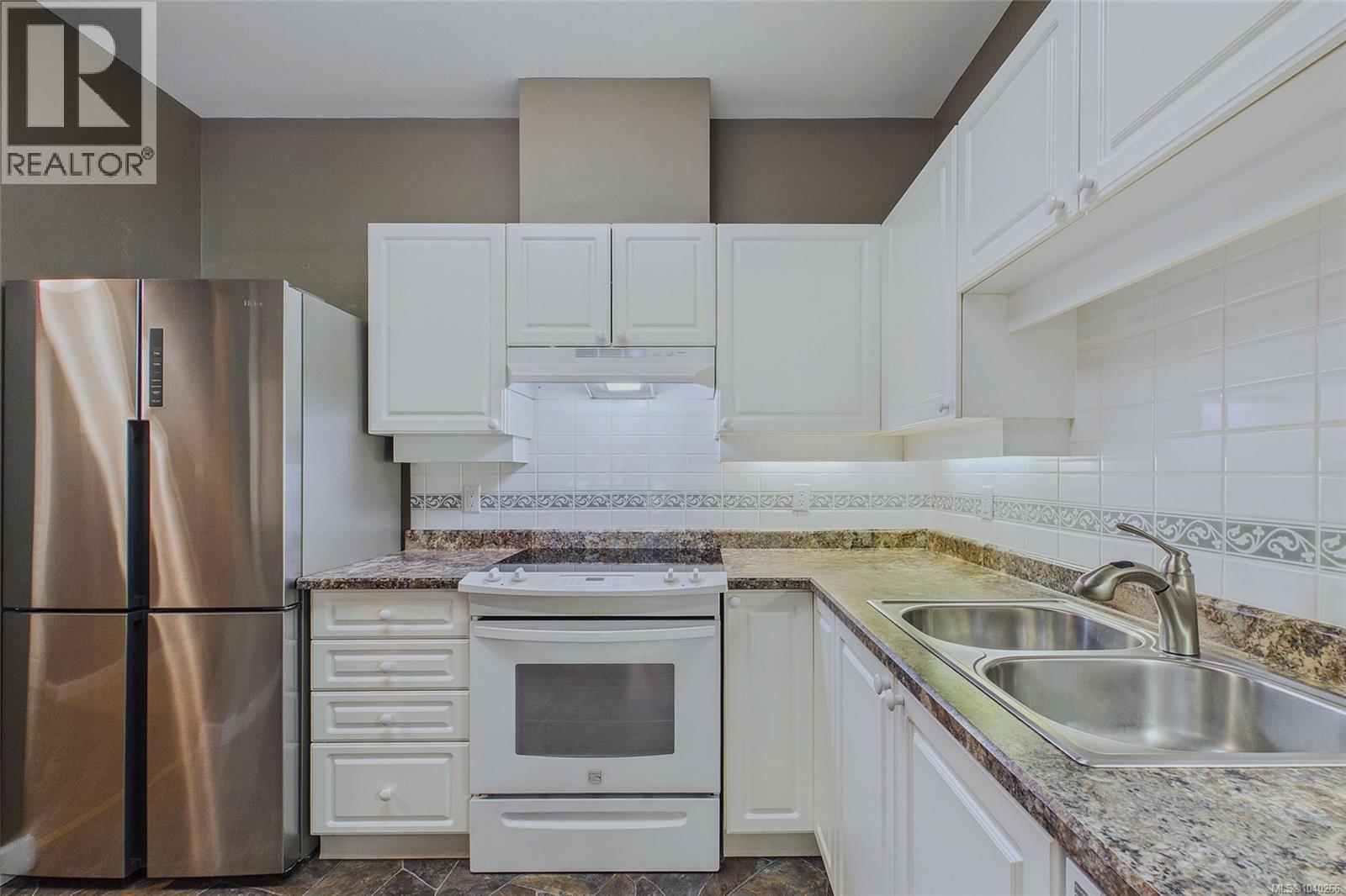 #101 5650 Edgewater Lane - 5