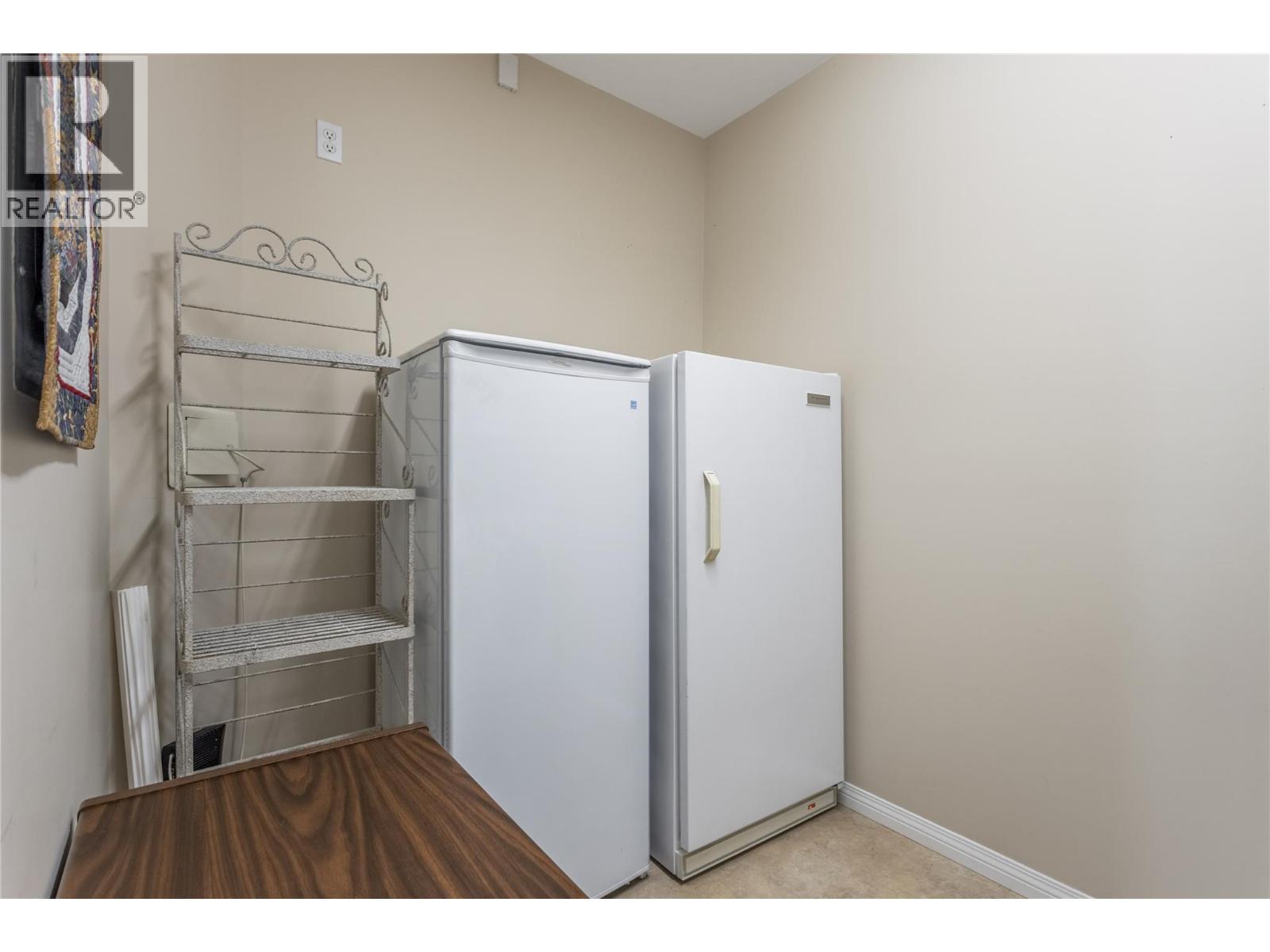 #213 1960 Enterprise Way Lot# 123 - 21