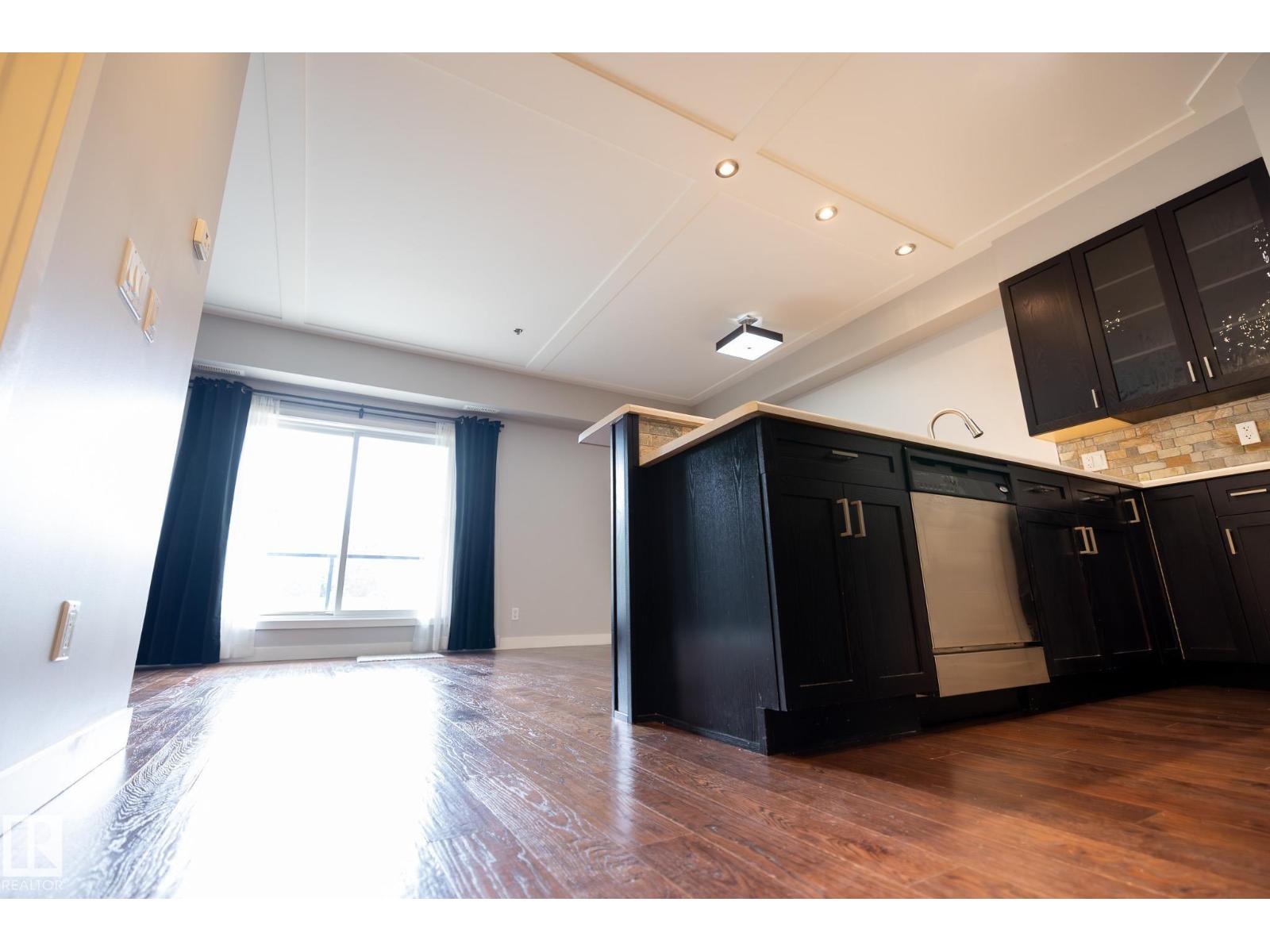 #207 9750 94 ST NW - 12