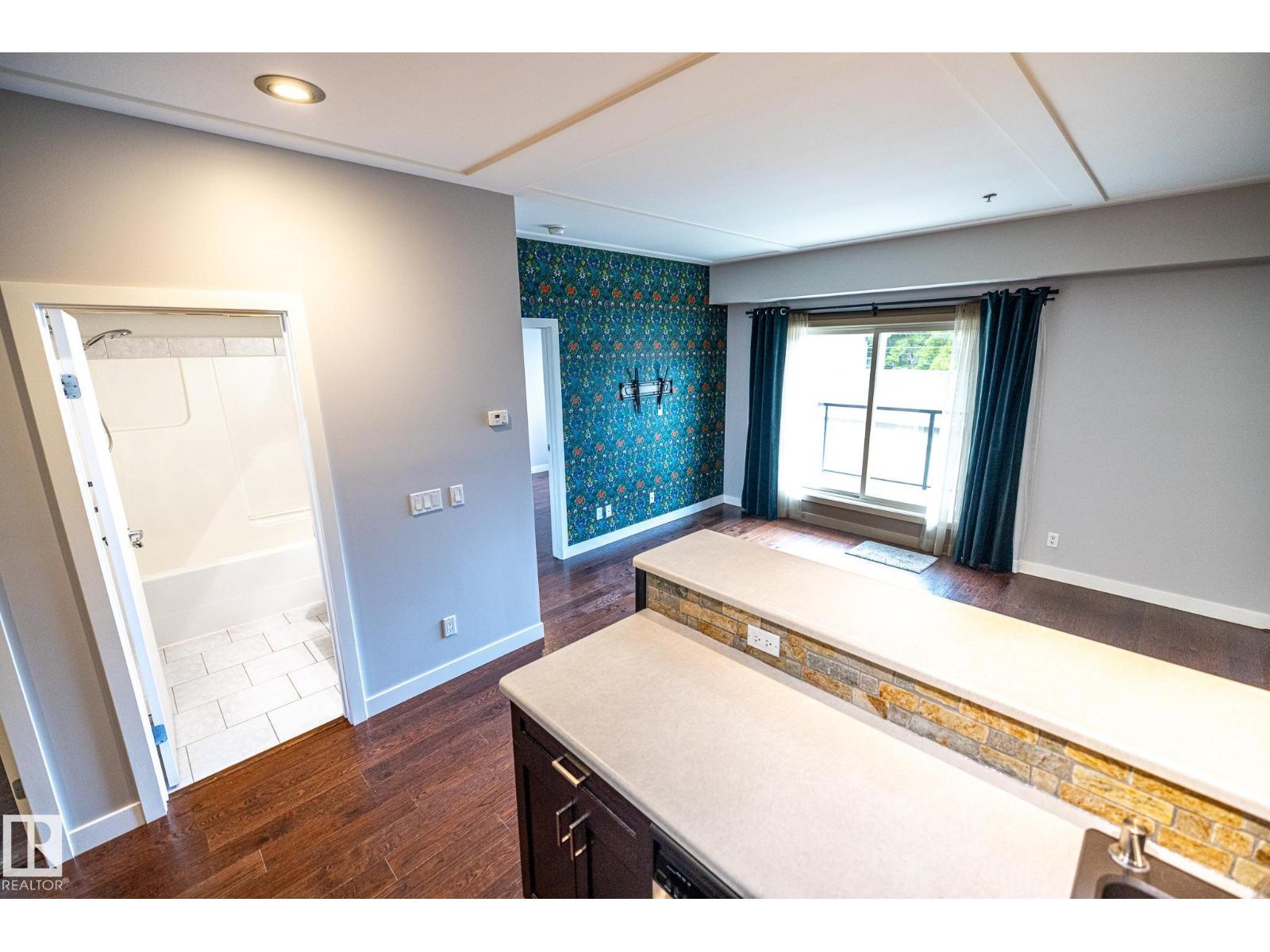 #207 9750 94 ST NW - 7