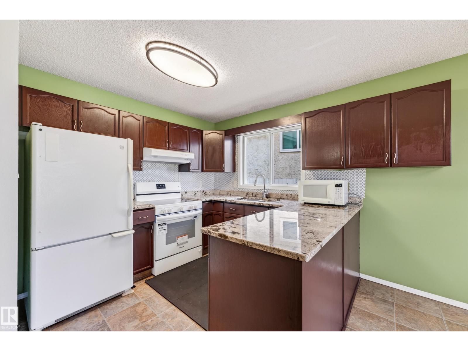 18351 77 AV NW - 21