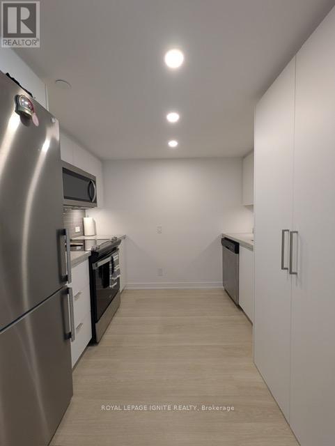 #418 30 TRETTI WAY - 2