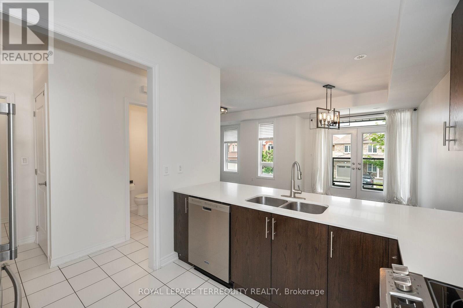 Kitchen Breakfast Bar Overlooks Living Area