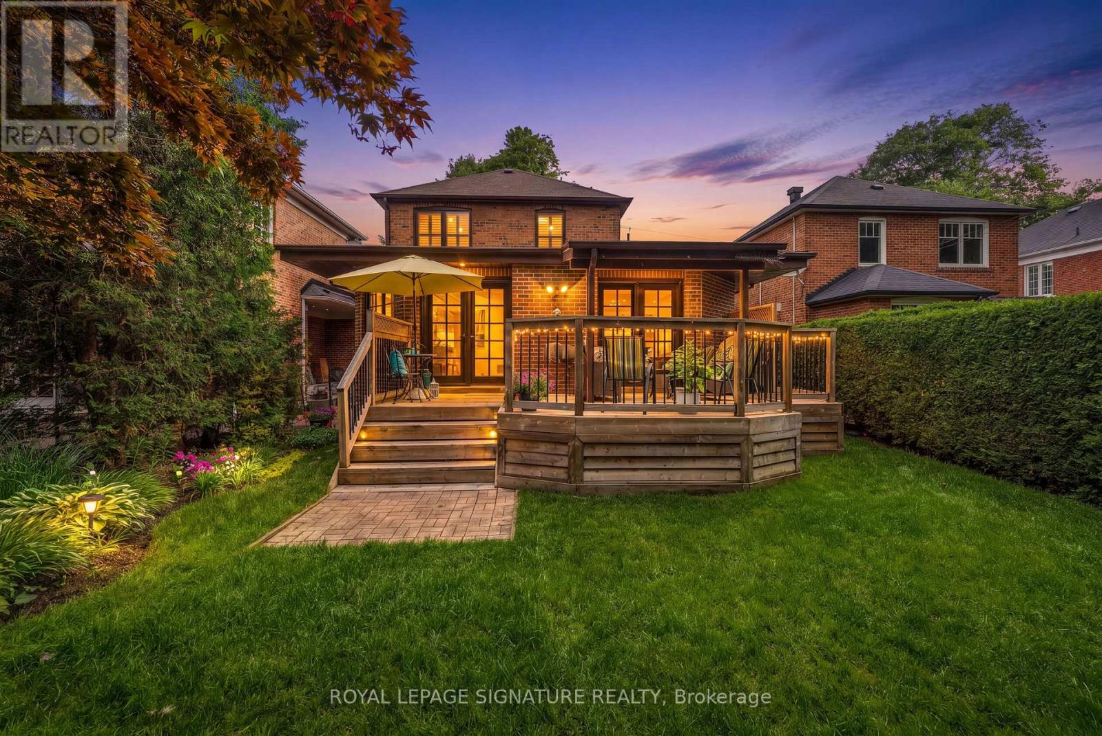 REAR YARD WITH SPACIOUS ENTERTAINMENT DECK
