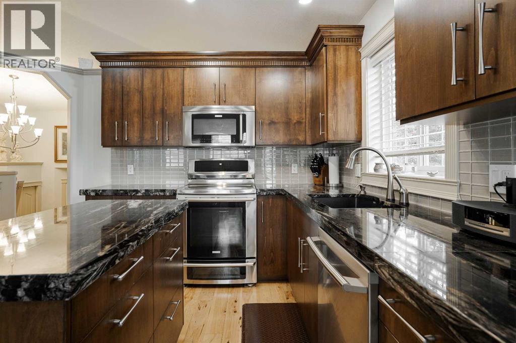 Custom kitchen, alderwood cabinetry + granite counters