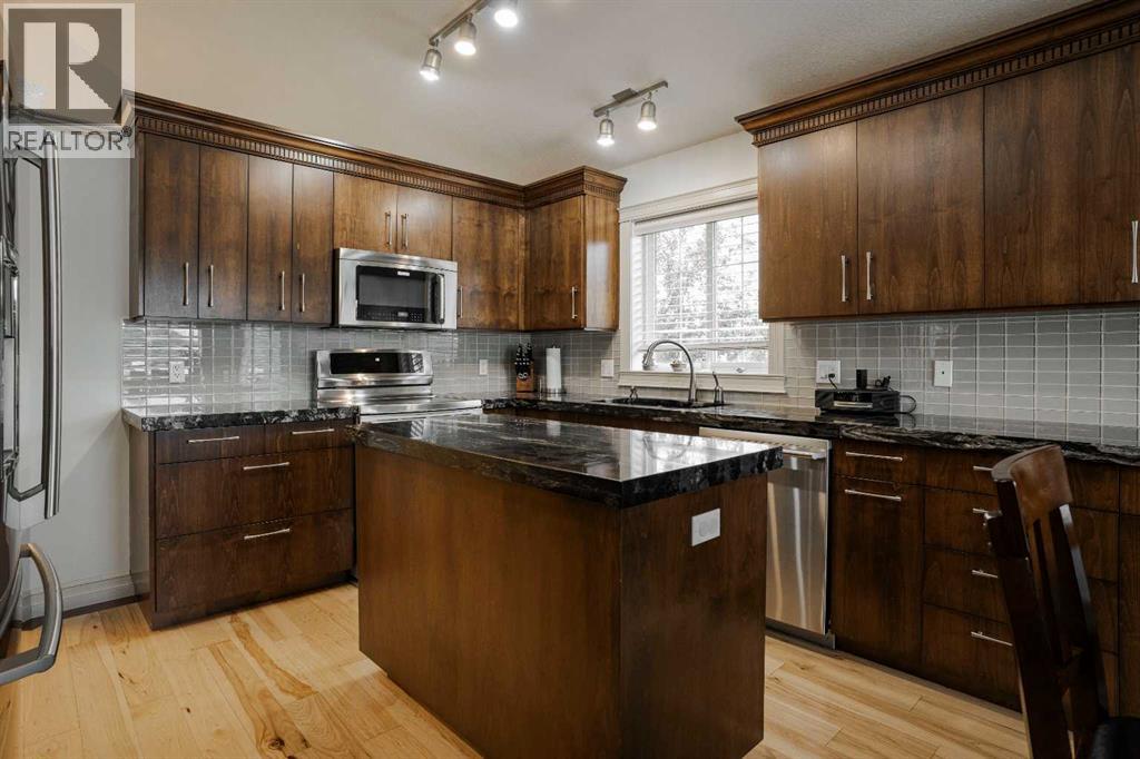 Custom kitchen, alderwood cabinetry + granite counters