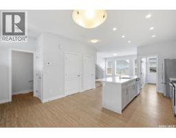 Family room - 251 Newton Link, Saskatoon, SK S7V0M8 Photo 11