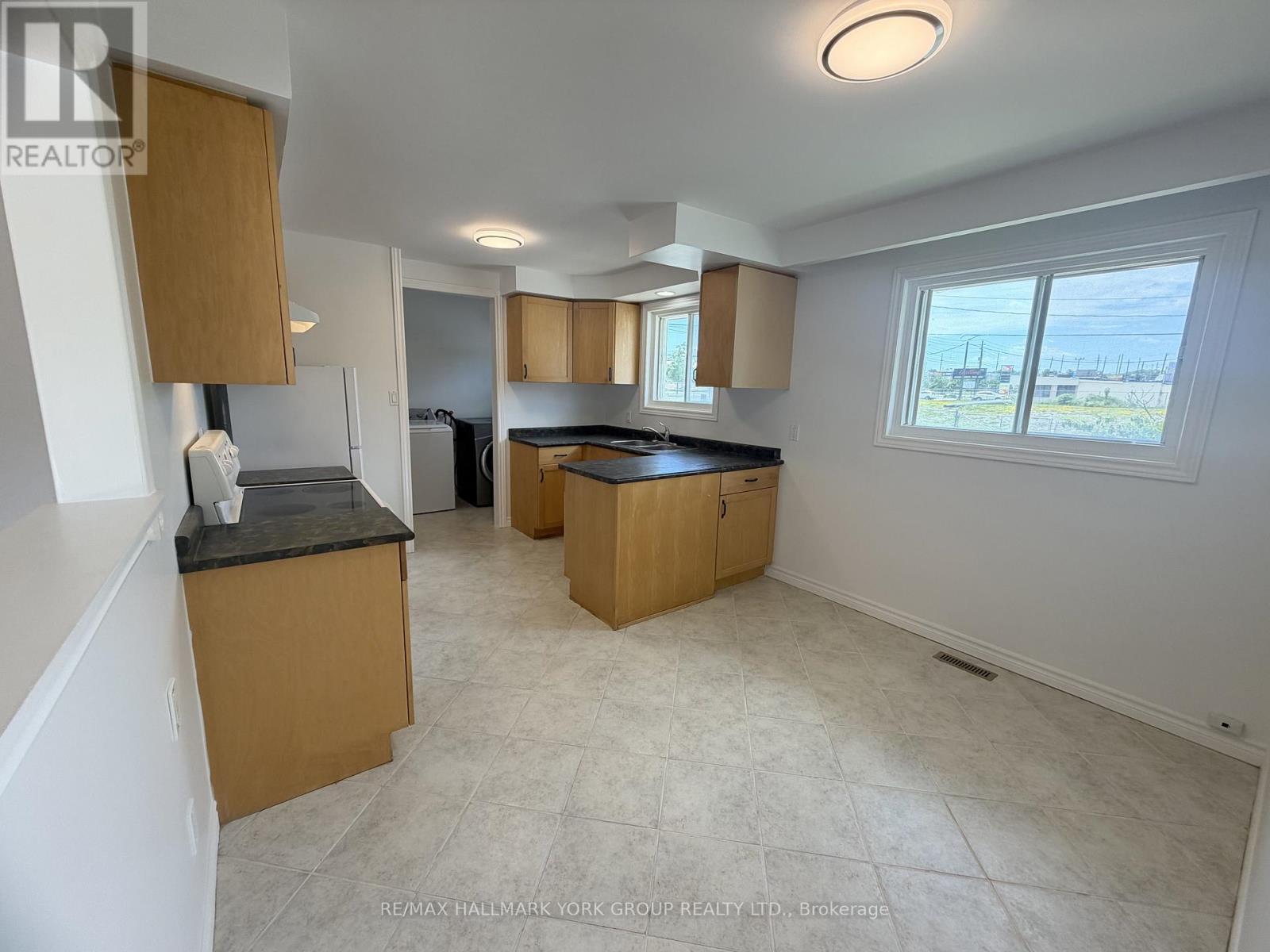 eat in kitchen with lots of storage&bright windows