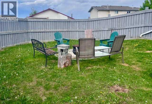 SIDE YARD FIRE PIT AREA