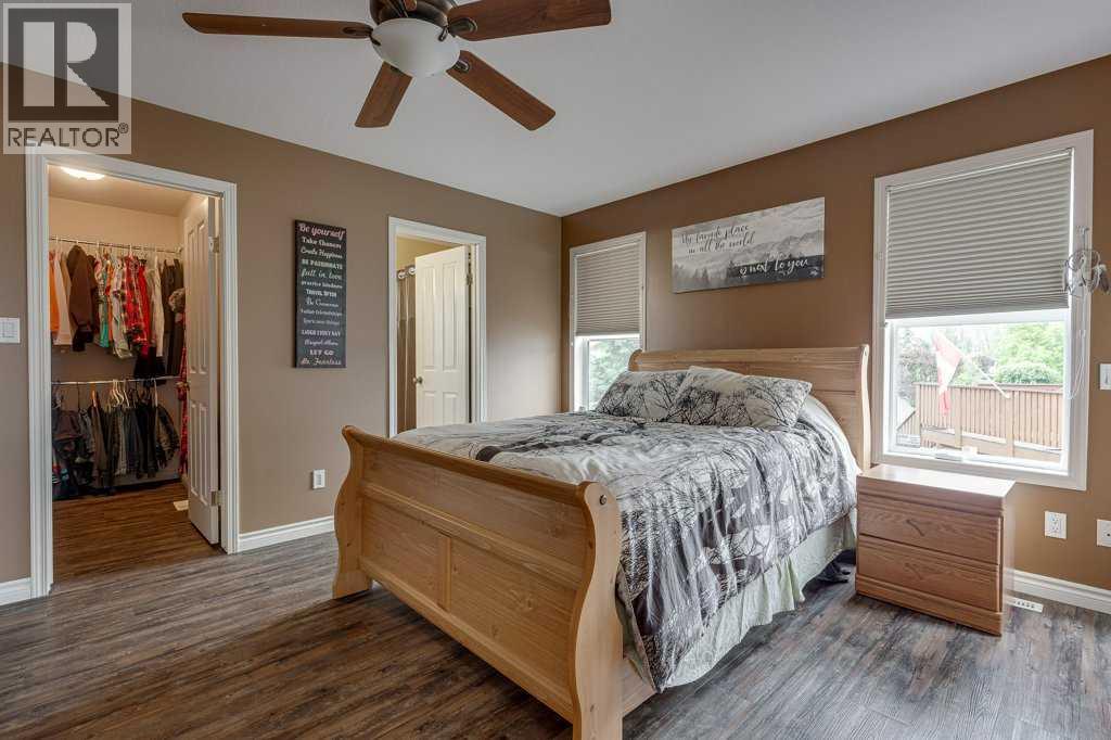 Primary bedroom with ensuite and walk-in closet