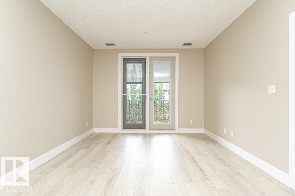 #256 6079 MAYNARD WY NW — photo 23