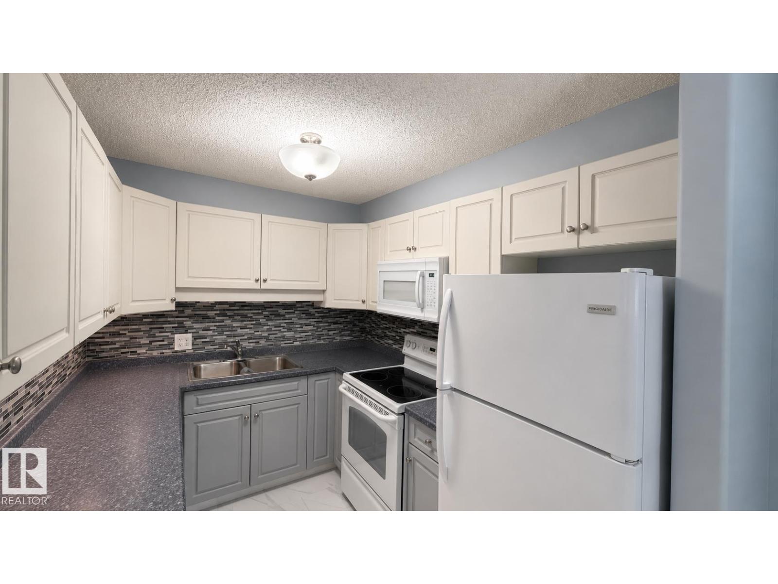 #202 13635 34 ST NW - 3