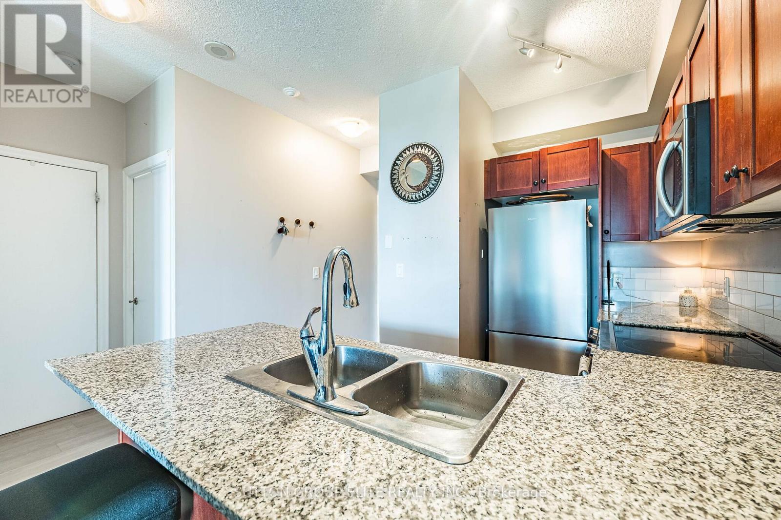 #308 1359 RATHBURN ROAD E - 18