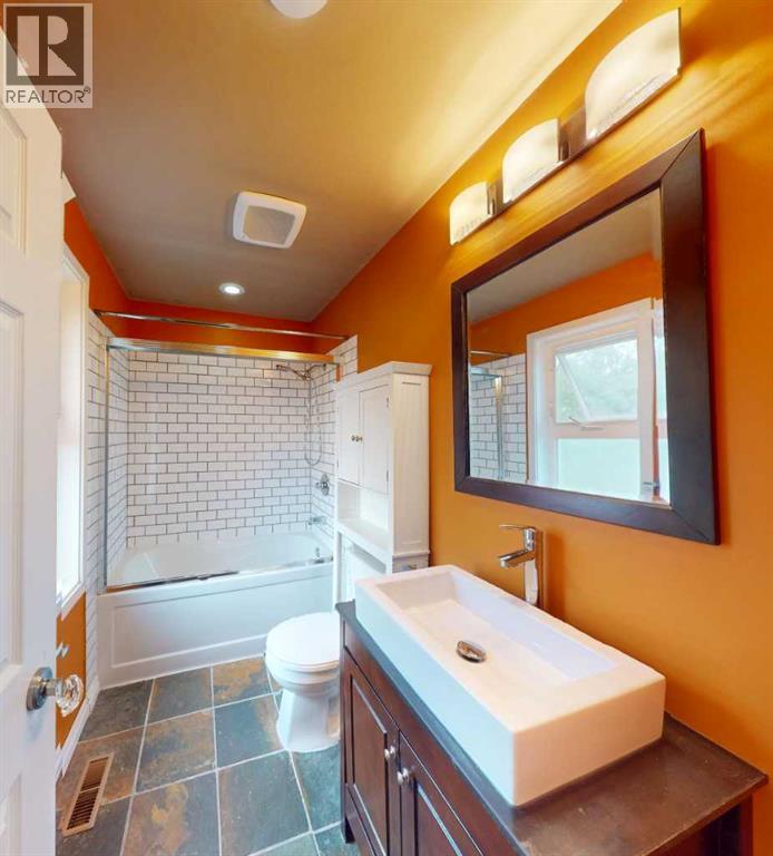 9105 96 Ave - 11