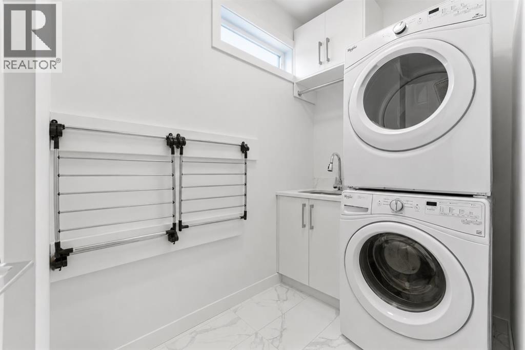 Laundry Room with a Sink & Hanging Rack & Space for Storage