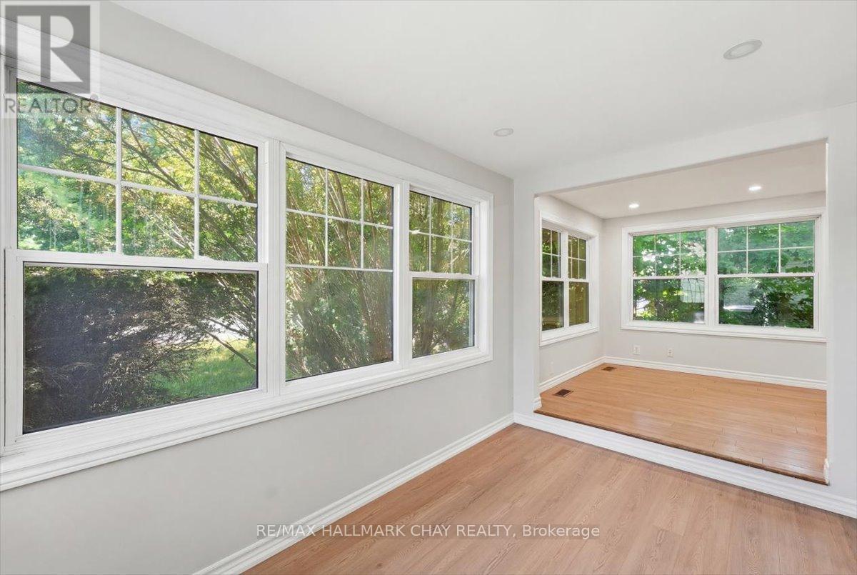 LARGE WINDOWS ON FRONT OF HOUSE