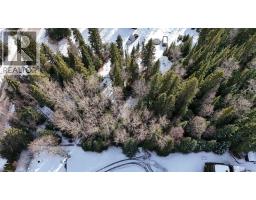 Primary bedroom of 8911 HALDI ROAD · Prince George, BC
