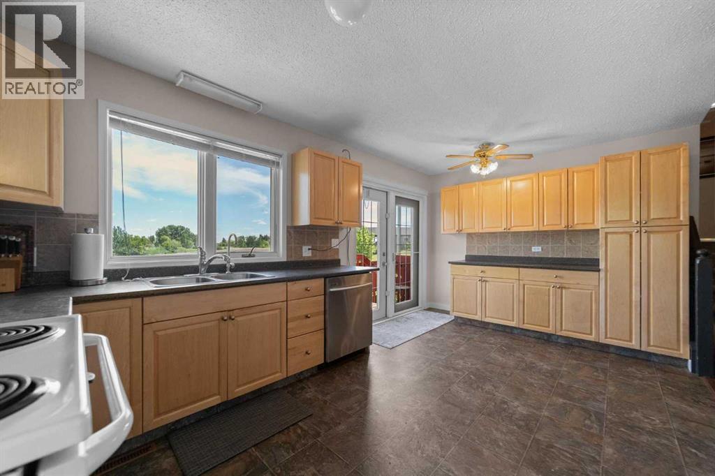 Kitchen with doors to the deck