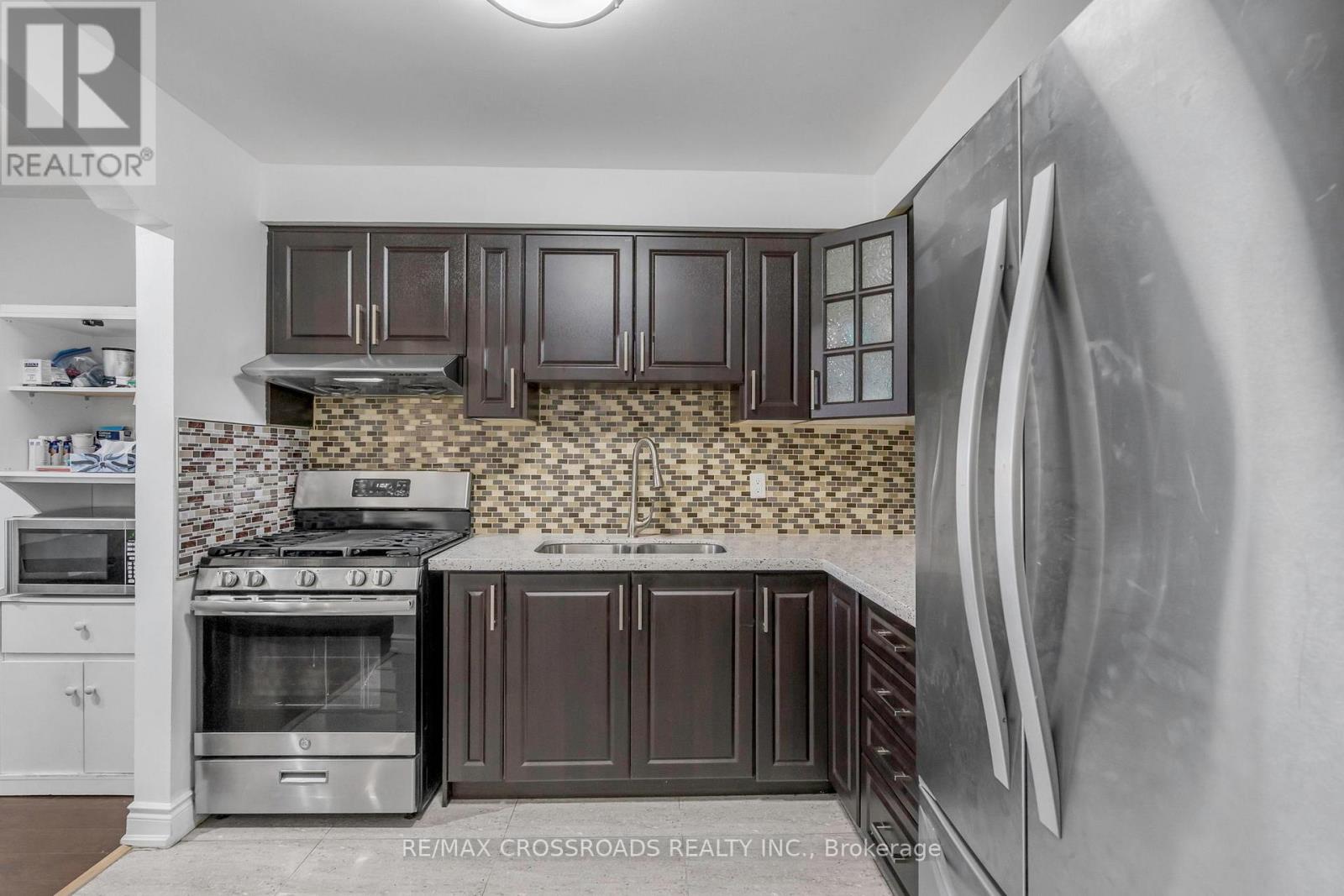 #12 7450 DARCEL AVENUE - 7