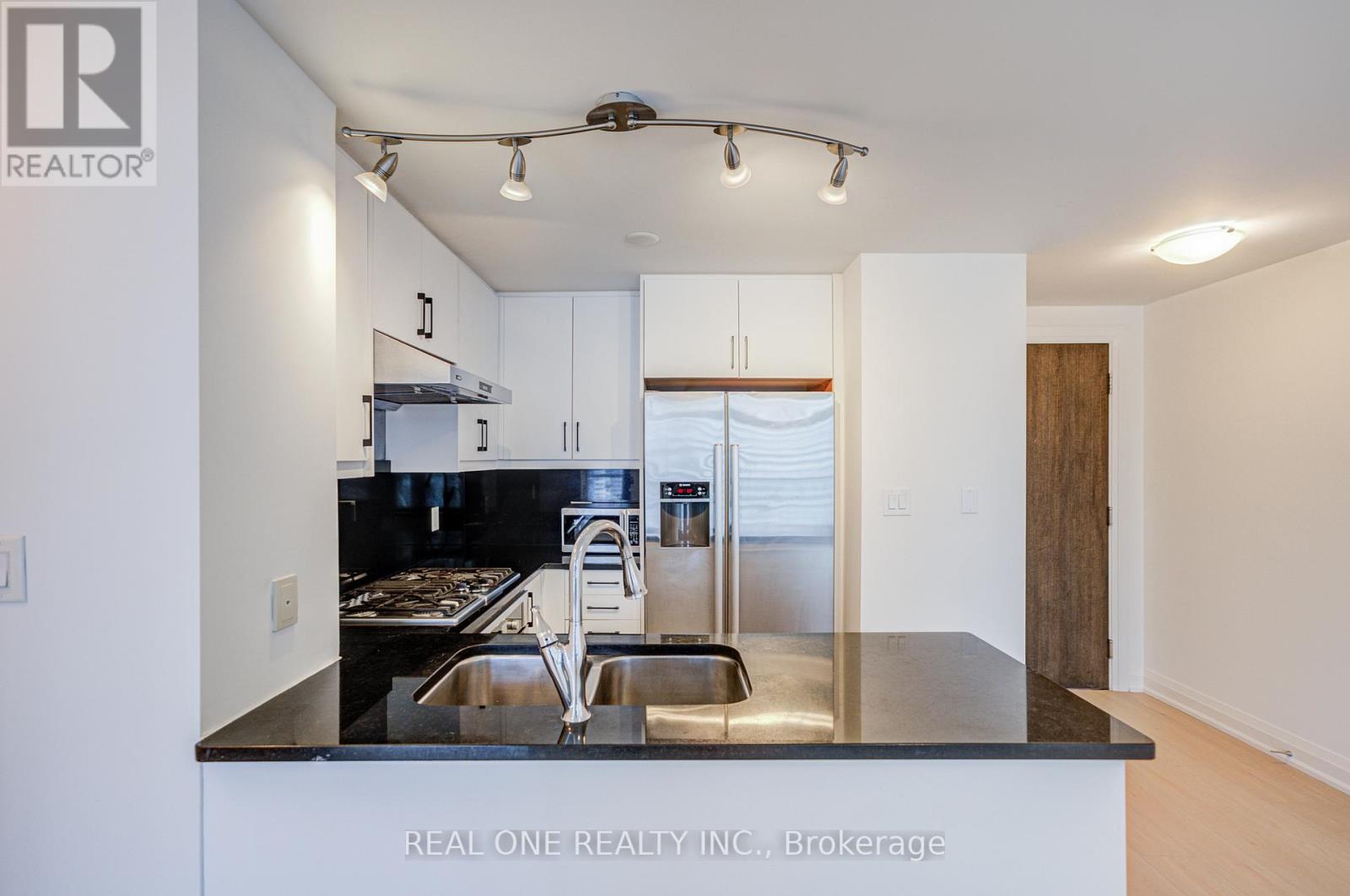 Newly Renovated Kitchen With Granite Countertop